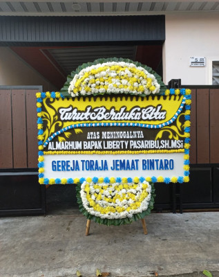 Papan Bunga Duka di Gantar